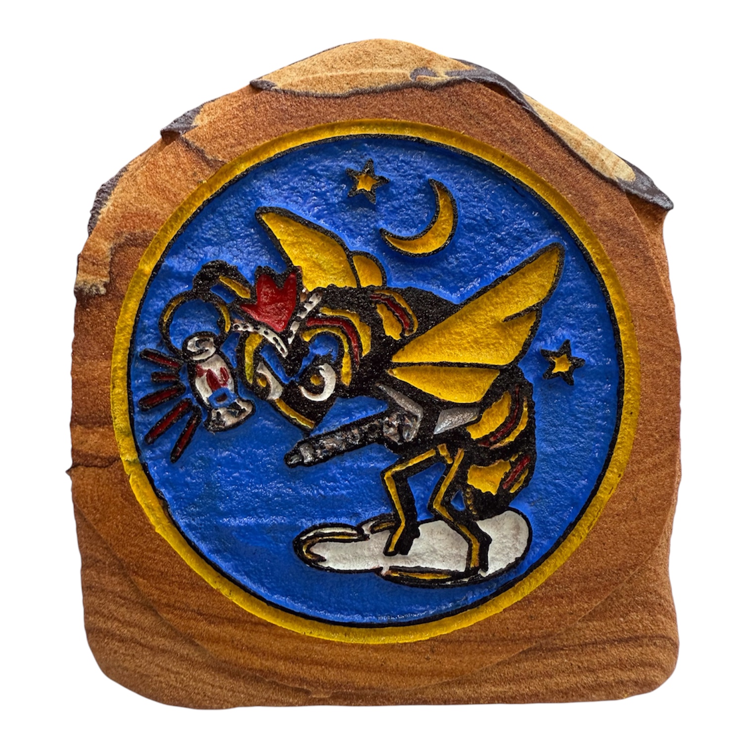 Colorful engraved bee emblem on sandstone